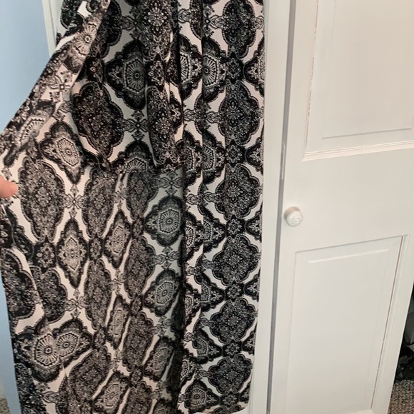 Flirty high low  romper with exposed shorts - Picture 2 of 4